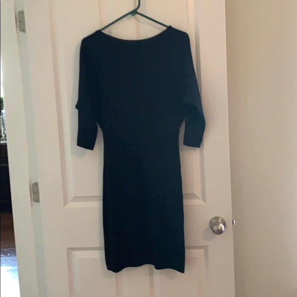 The limited black sweater dress